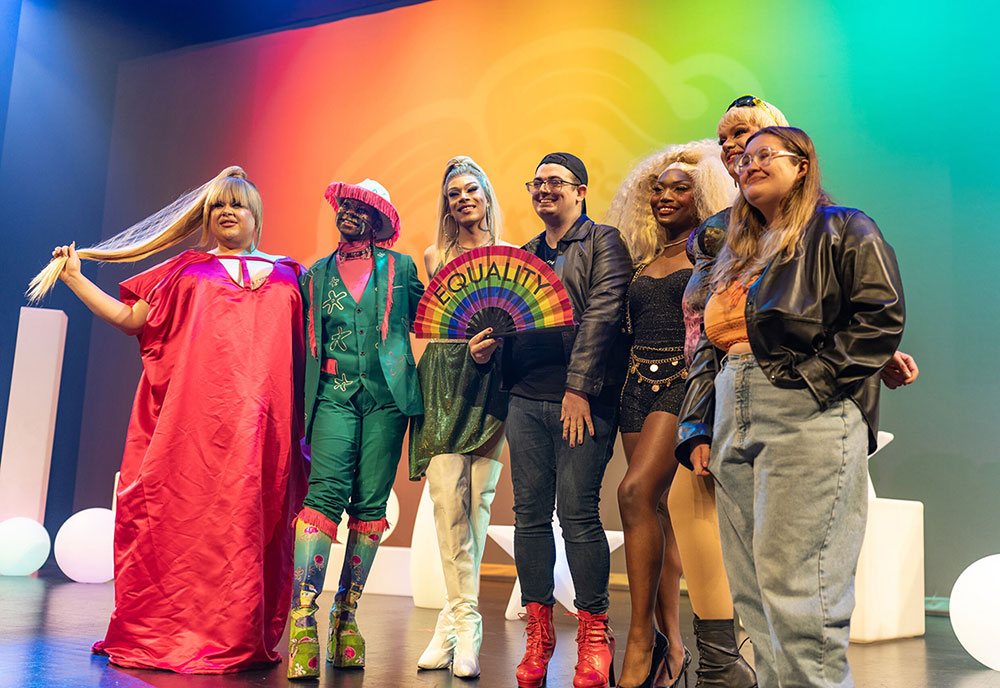 Group photo on stage at Winter's a Drag