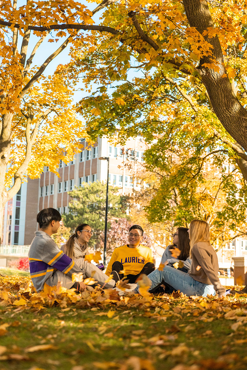 Students chatting outside of Waterloo Library