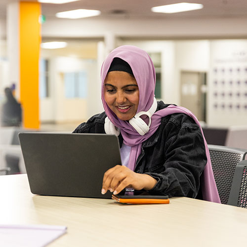 student studying in Brantford lounge