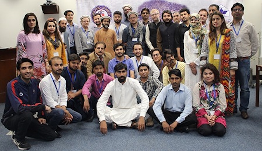 Group of workshop attendees posing for a group photo