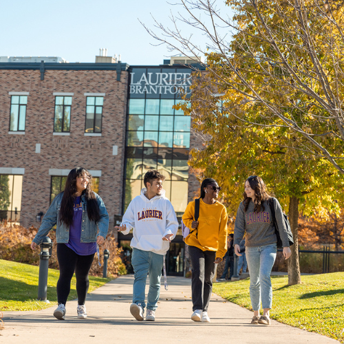 Photo of students walking outside the Research and Academic Centre