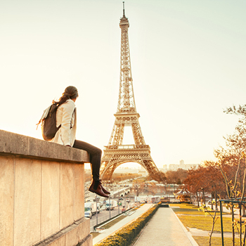 Student in front of Eiffel Tower