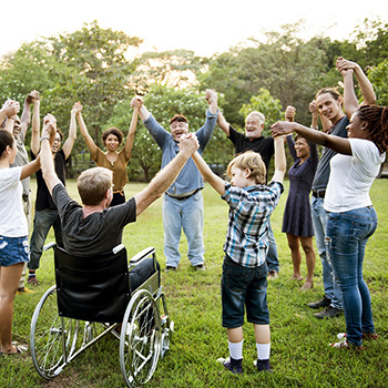 People in a circle holding hands