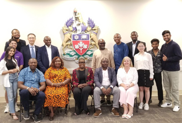 Nigerian executive leaders pose with Laurier staff and students