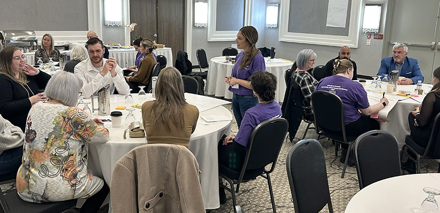 Participants chatting at the Brantford Community Safety Search Conference