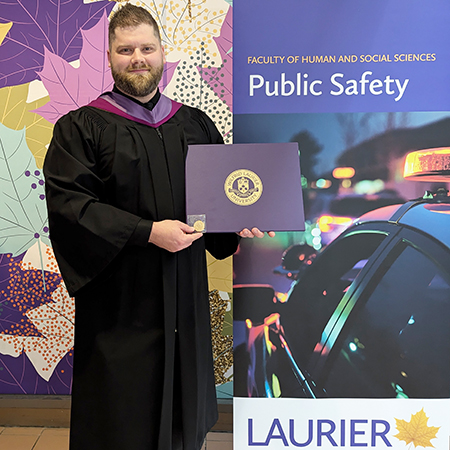 Nick Merritt balances duty, family and academics to earn Master of Public Safety degree.