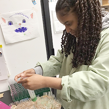 Savanna Spencer working in research lab