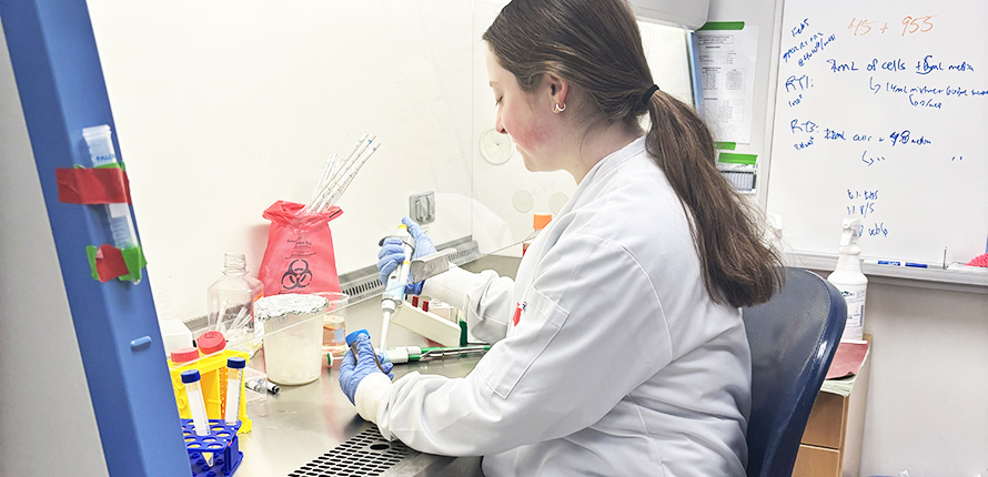 Tamar Barth working at a lab table